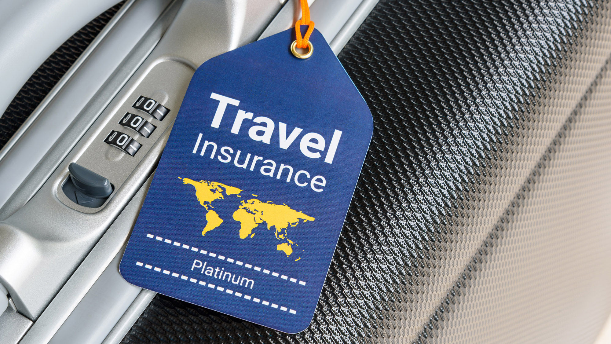 Travel insurance tag on luggage